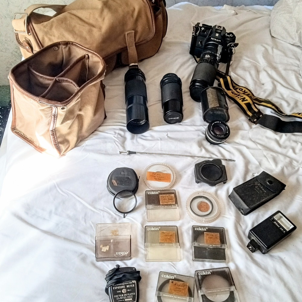 Nikon SLR Camera and Lens Kit with Tan Carry Bag and Black Body